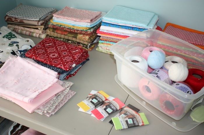 Lots of yard goods, sewing notions