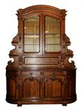 French buffet in oak with carved fruit and curves sides