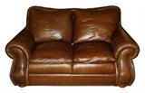 Leather loveseat with nail head detail