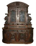 19th century French Mannerist buffet in oak with figural carving and Bacchus head focal