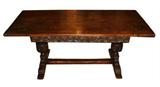 Jacobean dining table in oak with carved apron