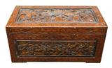 Carved oriental trunk