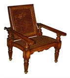 Plantation chair with caned seat