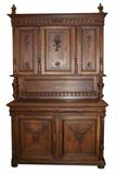 French Henri II buffet in walnut with carved grape motif.