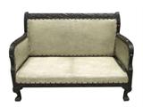 Carved English settee in ivory leather upholstery