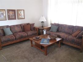Mission-Style Living Room Group:  2-Sofas, 2-End Tables & Coffee Table.  Sofas have Wood Frames and the Fabric is a rich darker color Southwest pattern.  They are 87" wide.