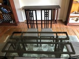 Hand-crafted ebonized walnut dining room table (glass top) and serving table with 6 designer black lacquer dining room chairs