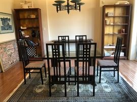 Hand-crafted ebonized walnut dining room table  (glass top) and serving table with 6 designer black lacquer dining room chairs