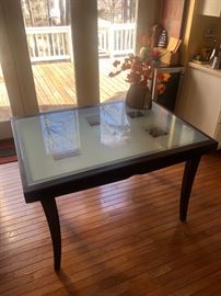 Fold-up wood and glass dining table