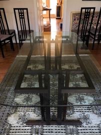 Hand-crafted ebonized walnut dining room table with glass top