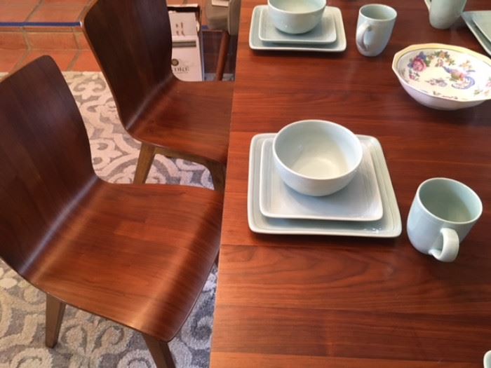 Detail of modern laminate chairs and table; service for 8 in Robin Egg Blue glazed ceramic 