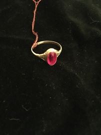 14k ring with semi-precious red stone