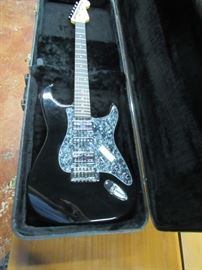 Fender style guitar with hard case