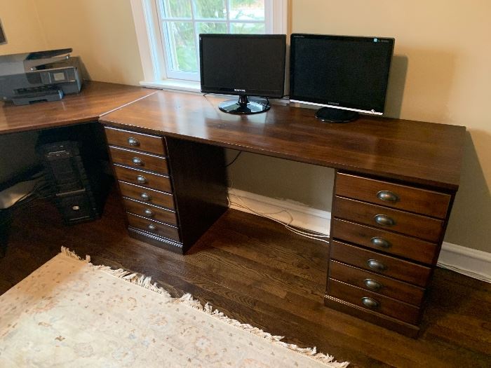 Office suite of Pottery Barn desks with corner unit.