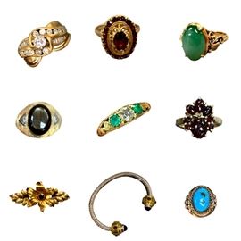 Gold and silver rings and bracelets.