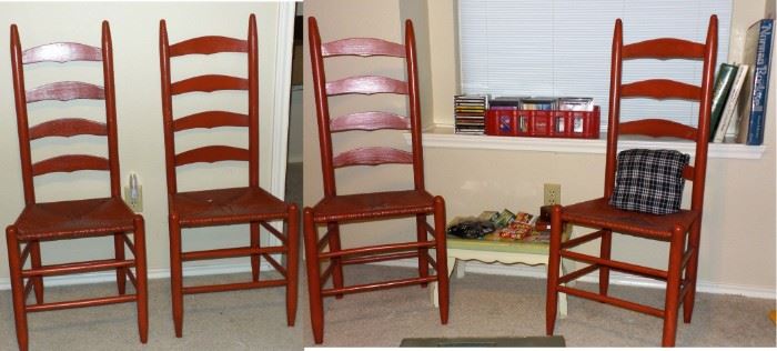 Set of red ladder back chairs with thrush seats