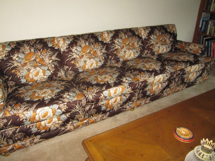 Long lean sofa waiting for new upholstery