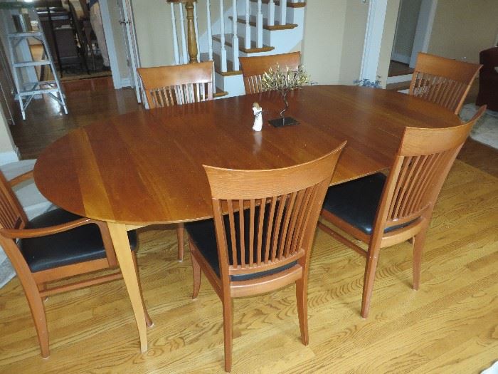 ROUND EXTENTION CHERRY TABLE WITH 6 CHAIRS
ROOM & BOARD 
