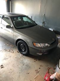 Lexus ES300.  1998 with only 77k miles!!  Light scratches to rear bumper and dent in front driver side wheel well.  Inside is in perfect condition.