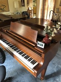 Baby grand piano.  In great condition.