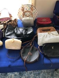 Large collection of purses and accessories