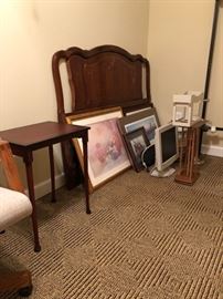 Full size bed frame with vintage wooden headboard.  Computer monitor with keyboard.  Other miscellaneous.