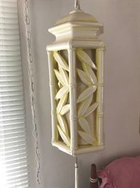 •	Polynesian influenced Hollywood Regency Bedroom hanging lamps