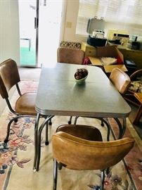 1950s atomic Eames period table and chairs. chrome base.