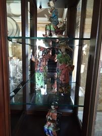 Lovely hand painted Asian porcelains, the kind that break if you stare at them very hard.
Also, if you lean in real close, they can often be heard to say "Me love you long time!"