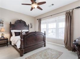 Bernhardt mahogany queen size "Grand Savannah" low poster bed, with Yves Delorme linens.