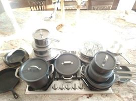 Very nice selection of cookware by Calphalon, All-Clad and Lodge cast iron.