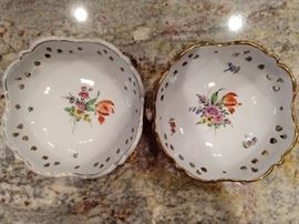 Pair of antique, hand painted Von Schierholz German porcelain dishes, with applied flowers.
