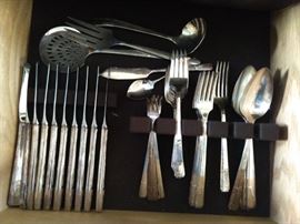 Full service for 16 (only 8 pictured) "First Love" silverplated flatware.