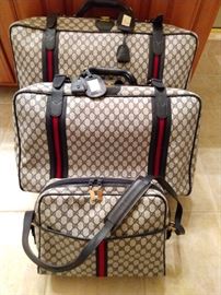 Gucci, Gucci, get your Gucci here! Louis who? It's red hot and there's a matched set of four pieces. We're fresh out of Pucci and Fiorucci, BUT, we's got da Gucci!
