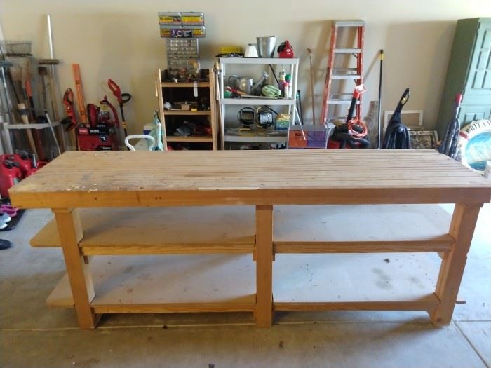 For the manly man or woman who's good with tools, this thing was in the basement and it took four of us he-men to lug this thing to the garage, so you better buy it! Behemoth dimensions of 8' long x 27" wide, the solidly constructed 2 x 4 top will take a pounding and never flinch.