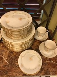 Service for 12 plus serving pieces for the Noritake china