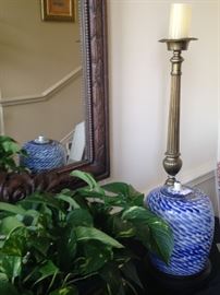 One of two brass candlesticks; one of two blue & white ginger jars (The mirror is not for sale.)