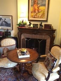 Very fine matching upholstered arm chairs; three leg round antique table