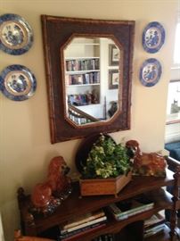 Burnt bamboo & red lacquered mirror flanked by 4 display plates from England