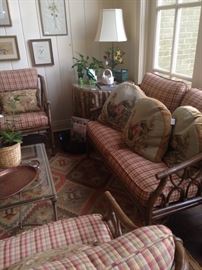 The garden room houses this bamboo set - settee and matching chairs