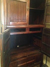 Chinese elm tall storage cabinet provides more than ample of storage. (Purchased at Early Fall Fine Art & Antique Auction in Dallas -Sept. 2004)