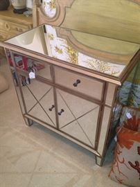 Mirrored chest with two drawers and two door