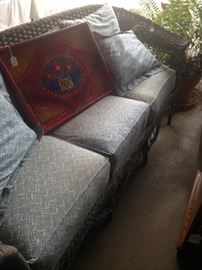 Blue wicker sofa (as is)