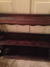 One of several antique wall shelf units from England