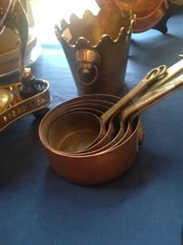 Antique set of copper measuring pans