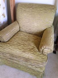 Tan and lime green armchair waiting for a new home