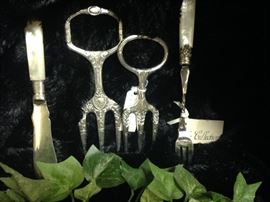 Vintage  butter knife, bread forks, and Victorian pickle fork (Mother-of-Pearl handle) from England
