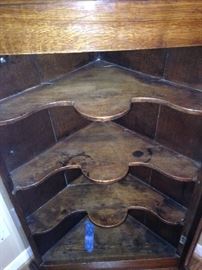 Inner scalloped shelving (key included-taped on bottom shelf)