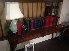 Another sofa table with set of 40 leather bound Derrydale Press Hunting Stories (rare to have the whole set); celadon lamp