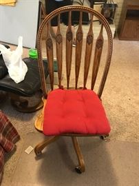 #51	Oak Desk Chair on Wheels w/carved Back	 $75.00 
